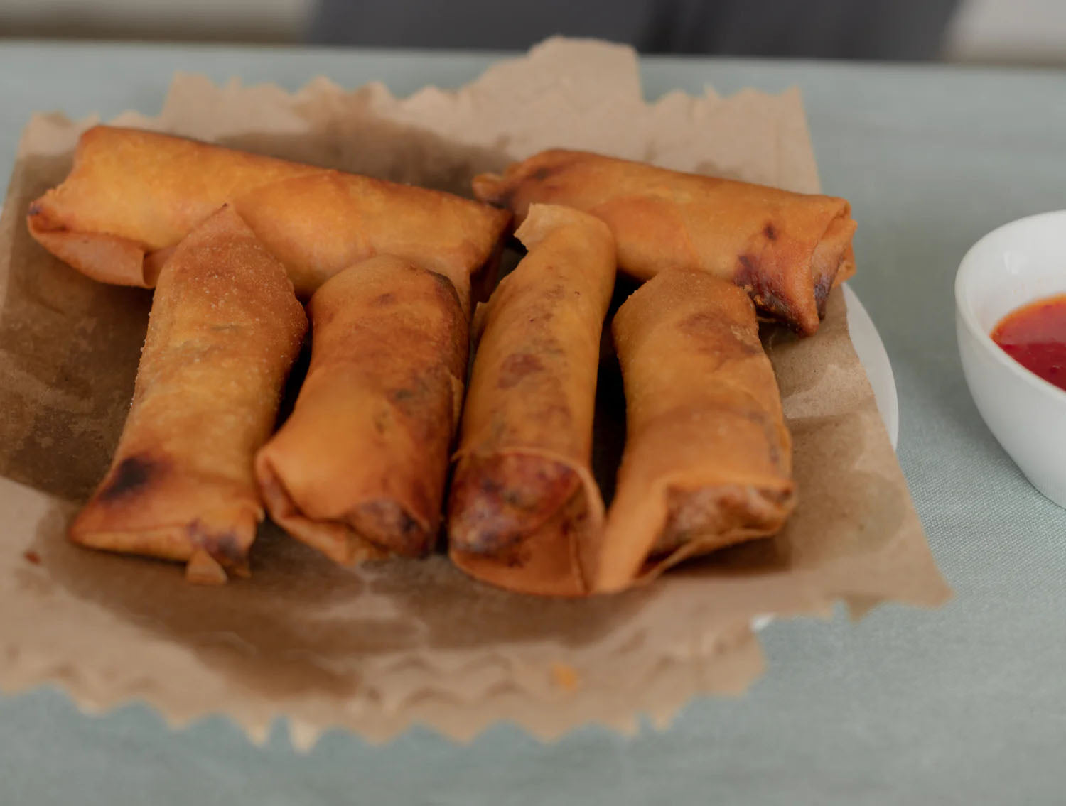 A pile of six egg rolls.