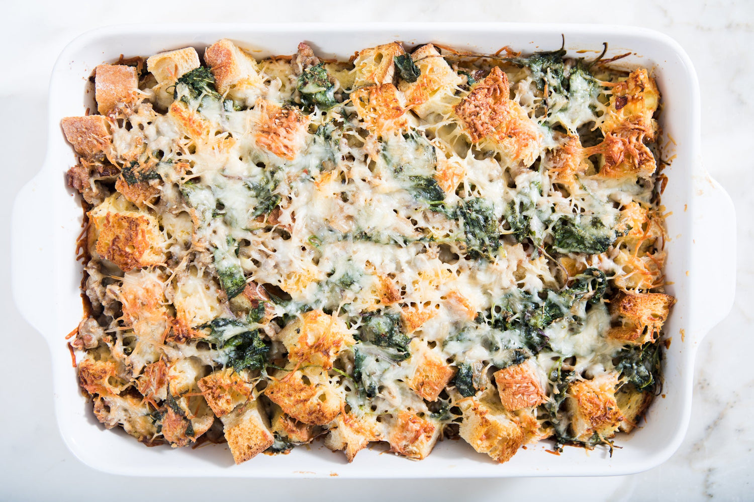 A baking dish with breakfast strata.
