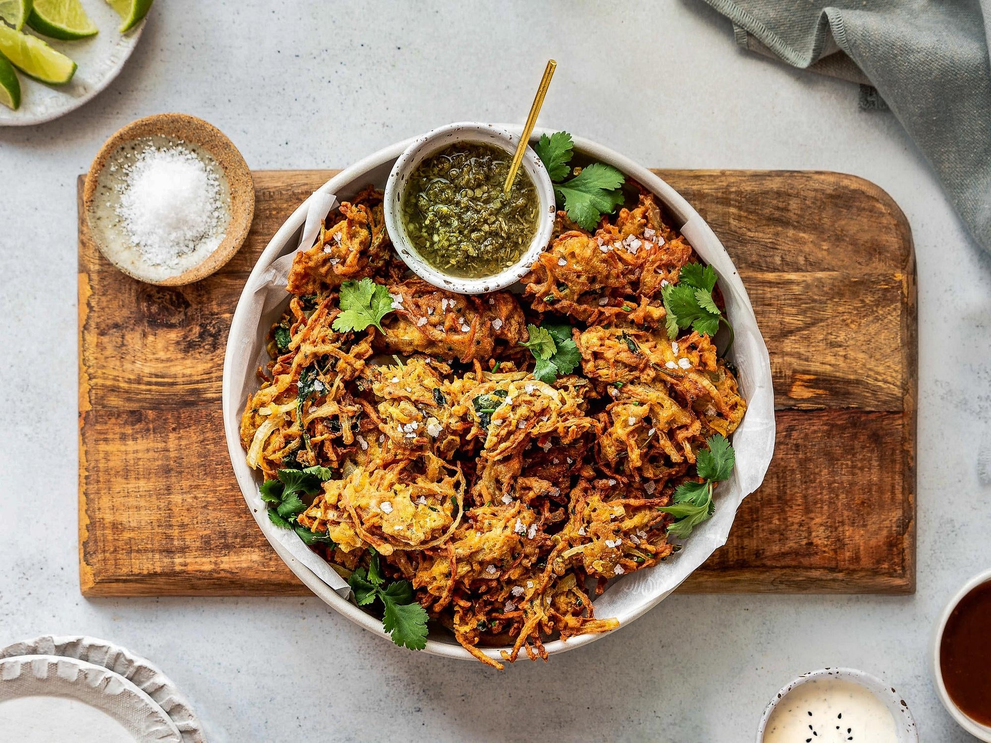 A bowl of fried butterfish squash and carrot fritters.