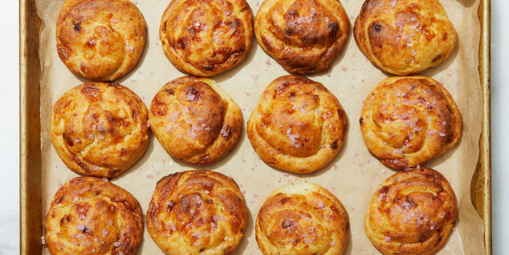 A tray of twelve gougère pastries.