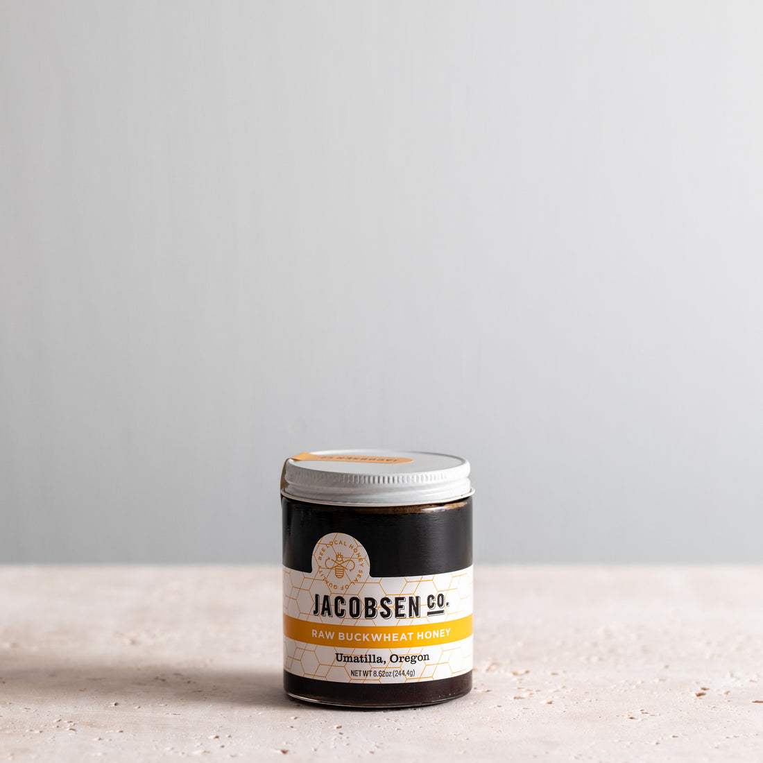 8.62 oz jar of Jacobsen Raw Blackberry Honey