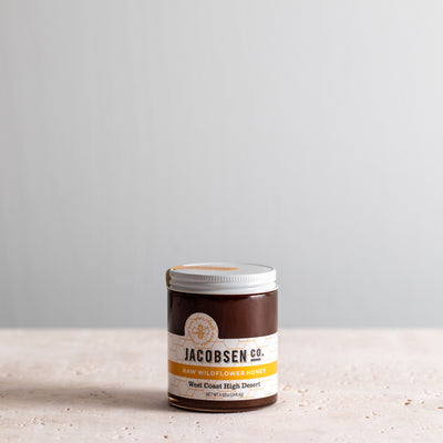 8.62 ounce jar of Jacobsen Raw Wildflower Honey